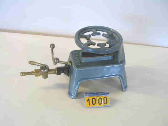  Collection ASPEG, pièce numéro 1000 : Chauffe fer à friser et réchaud gaz