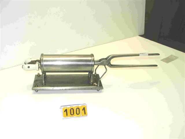 Collection ASPEG, pièce numéro 1001 : Réchaud et son fer à friser