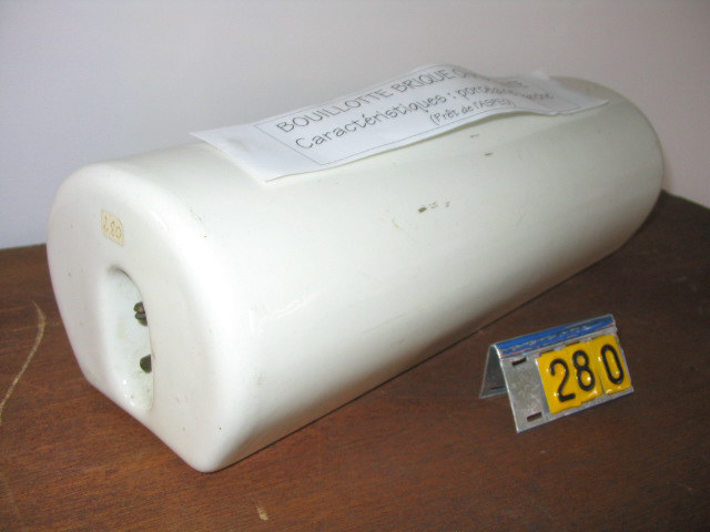  Collection ASPEG, pièce numéro 280 : Bouillotte brique chauffante